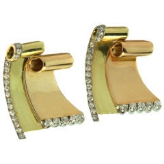 Pair of French early  Vintage gold and diamond 'Wave' clip pins.
