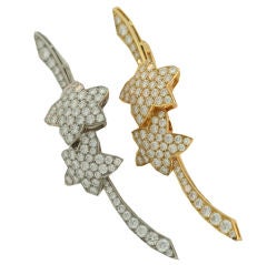 Pair of Van Cleef & Arpels Diamond Stars Wave pins