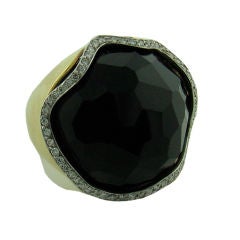 Vintage Faceted Onyx Ring in 18K Yellow Gold with Diamonds