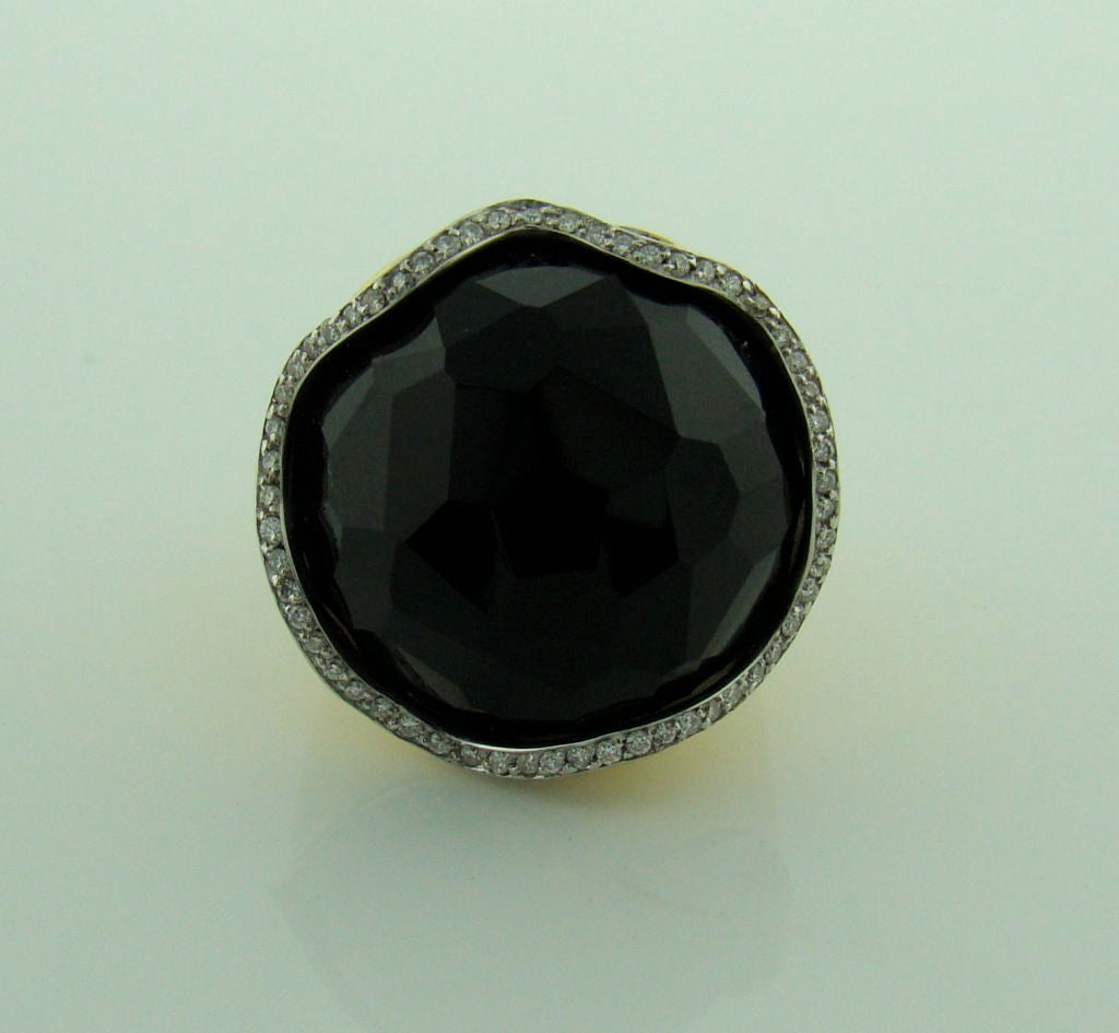 Vintage Faceted Onyx Ring in 18K Yellow Gold with Diamonds