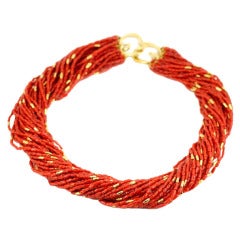 30 Strand Coral Bead & 22KT Gold Bead Necklace