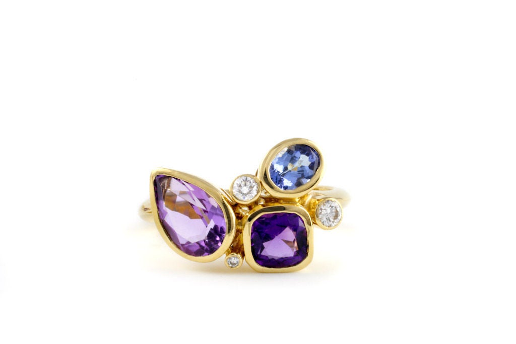 Playful, everyday violet colored ring.  This ring is part of a collection inspired by the whimsical shapes and colors in a kaleidoscope. Designed and made in-house by Julius Cohen New York.