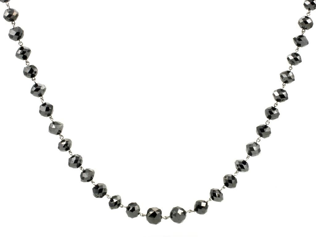 This black diamond bead necklace is both bold and elegant.  It is made from black diamond beads and linked together with platinum.  Designed and made in-house by Julius Cohen New York.