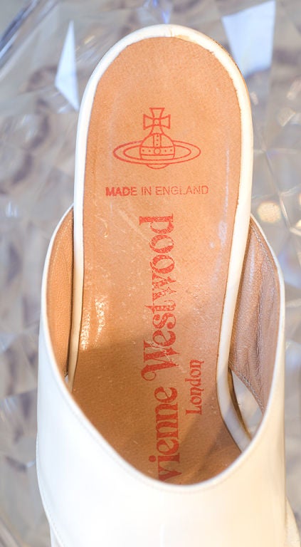 These late 1980s/early 1990s Vivienne Westwood white patent Rocking Horse shoes rock -literally.  They were inspired by sandals, clogs and the shoes that little girls wear.  Vivienne Westwood wanted movement so she had the platform sole designed so