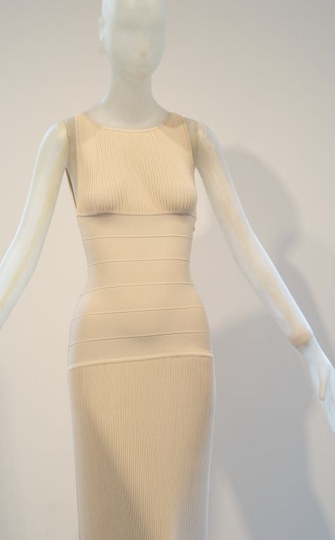 The photos of this 1990s Herve Leger dress really say it all.  You need a drop dead sexy body to go with this drop dead sexy dress.  Sorry!  Some Herve Leger mold you into an unbelievable shape but this one requires perfection.