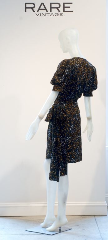 Sometimes we can not help but play favorites with some of our pieces at RARE vintage.  This is one of our favorite new silk dresses from Yves Saint Laurent.  The dresses from Nicholas Ghesquiere for Balenciaga are very much like this dress, though,