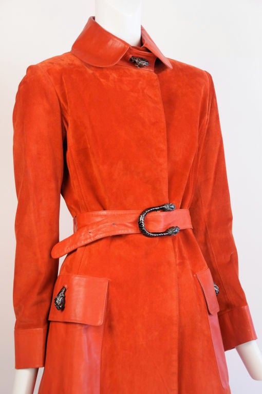Classic seventies Gucci red suede coat w/a detachable belt, and tiger-head hardware.  Beautiful leather details and texture.