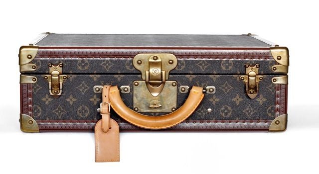 A Classic!!  <br />
Louis Vuitton attache case. Prefect for that light traveler. <br />
It has the Classic logo leather with a beautiful LV logo leather trim with brass tacks. <br />
Lock and keys still intact, with the leather name tag ready to