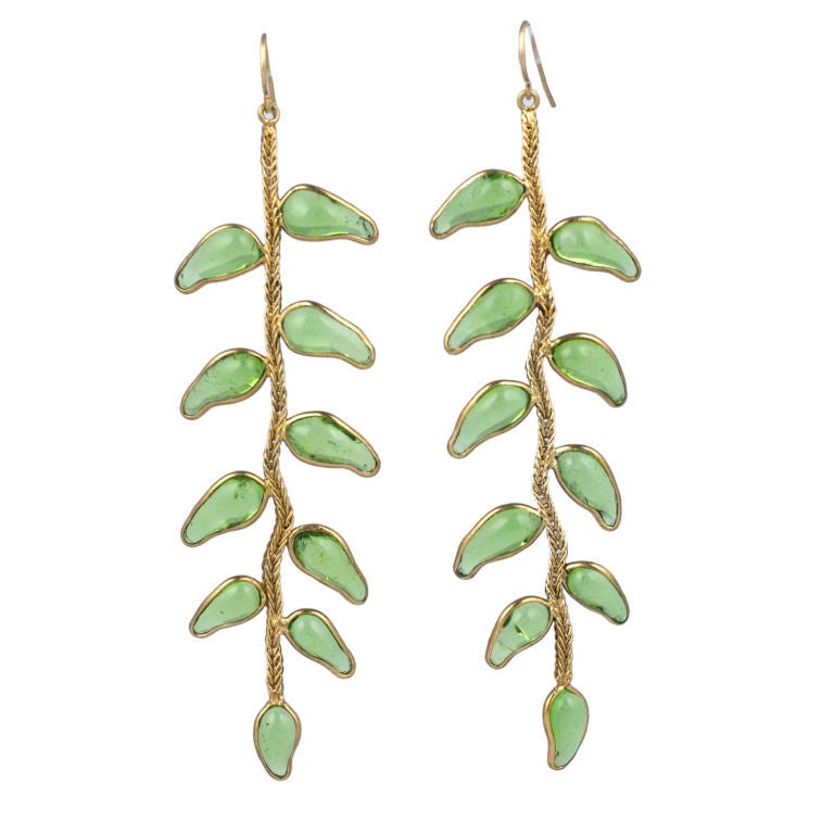 Poured glass vine earring in pale emerald and gilt metal from Mark Walsh Leslie Chin. Flexible chain allows vine to move with wearer. Handmade in France.<br />
New. Pierced wire fittings.<br />
Length 3.75