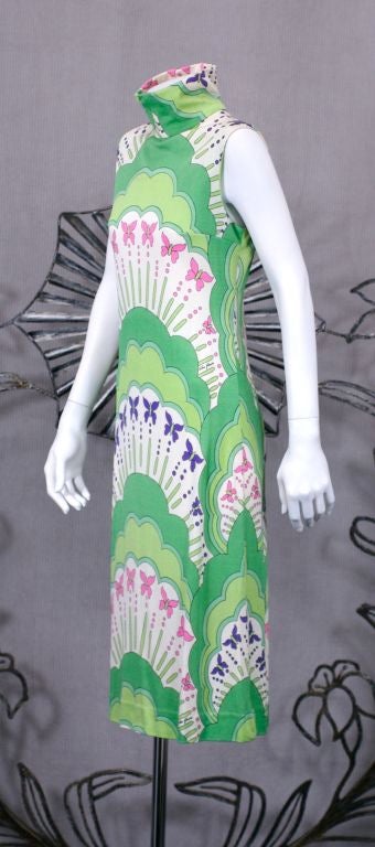 Charming print dress from Colin Glascoe UK from the 1960s. Pop inspired print of rainbows and butterflies.<br />
Back zip entry,<br />
Excellent condition.