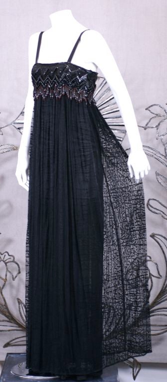 Yves Saint Laurent Ungetragenes perlenbesetztes afrikanisches Kleid (Schwarz) im Angebot