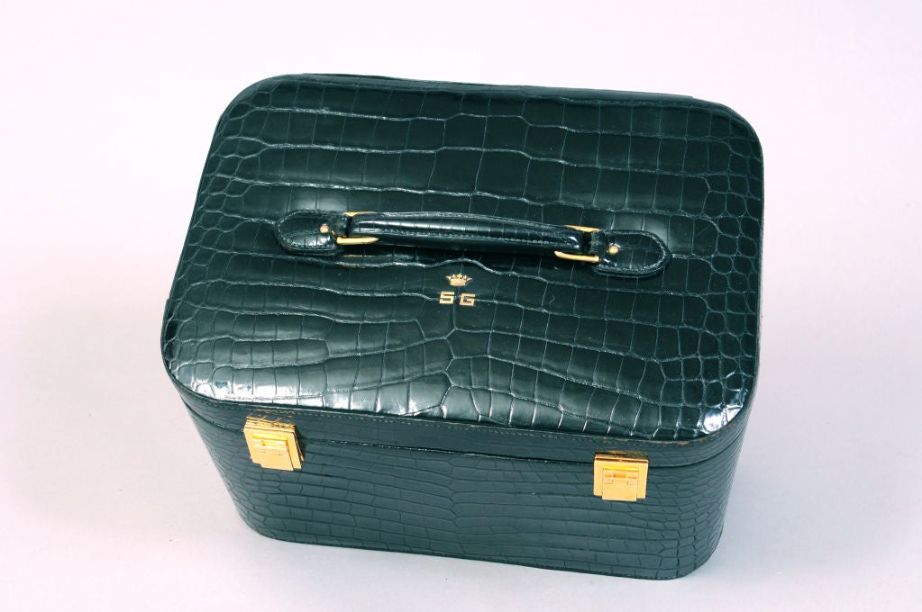 This luxurious Hermes black crocodile train case dates to the mid 1950's and it is from the estate of a titled French woman. Her gold coronet and initials are on the top of this lovely bag.<br />
<br />
The ultimate luxury leather goods are hand