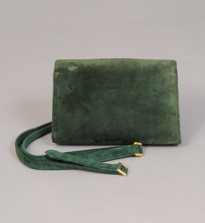 green suede clutch bag