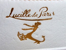 Lucille de Paris cream Ostrich day purse circ 1960s