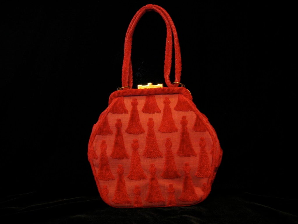 Red cut velvet evening bag with gold trims and detail. <br />
<br />
About the designer : -<br />
<br />
Roberta di Camerino<br />
<br />
Label of the Italian fashion designer Giuliana Coen Camerino (1920) who combined her own surname with her