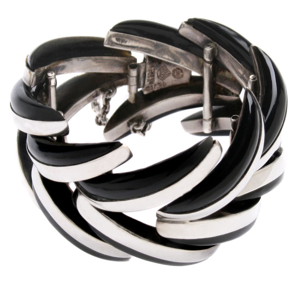 This is a wonderful bracelet by the Mexican Modernist Antonio Pineda.  The inner side of the bracelet measures approximaely 6.