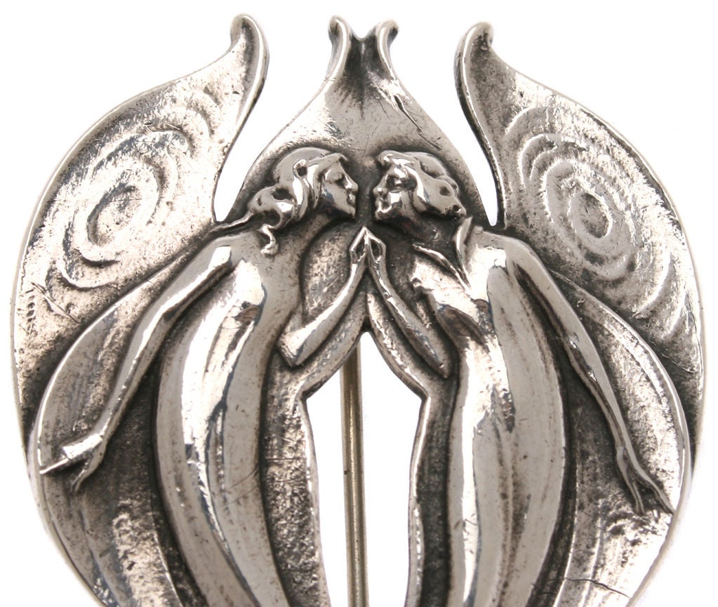 This is a beautifully executed brooch by Gorham depicting a pair of Fairies.