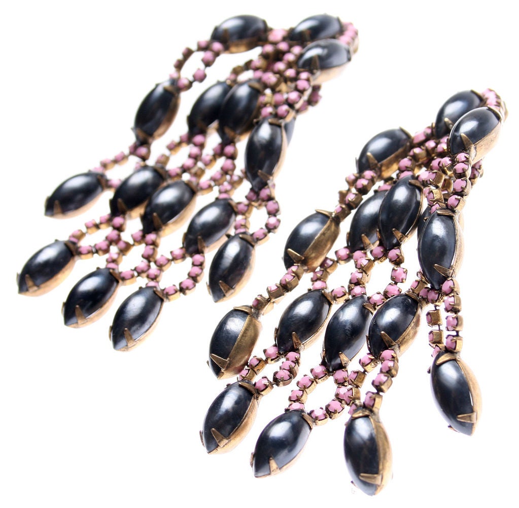 These are unusual and great looking KJL earrings with small faceted pink beads accenting ovoid black faux baroque pearls. 