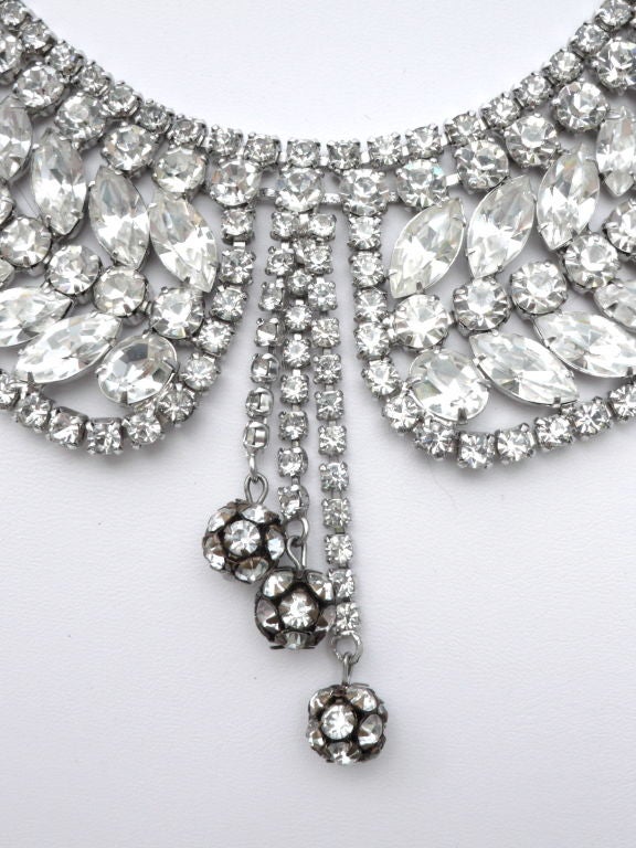 This rhinestone necklace looks beautiful with a casual t-shirt, an evening gown, or bare under a suit. It can be adjusted to fit.