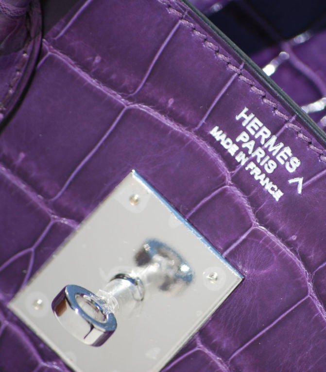 30cm Hermes Amethyst Crocodile Birkin with Palladium Hardware <br />
L Stamp<br />
<br />
The bag measures 30 cm/ 12