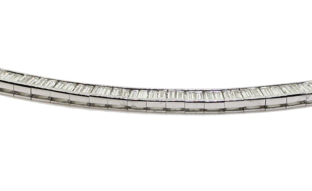 White Gold necklace containing a full circle of approximately 244 baguette diamonds with an approximate total weight of 19.35 carats.