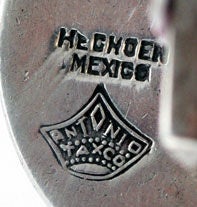 PLEASE VISIT LAUREN STANLEY IN NEW YORK CITY

  Fine pair of fine and large circa 1955 sterling silver cuff links by Antonio Pineda, of Taxco, Mexico, in an ancient and historical aztec design with cut outs of silver applied to a background of