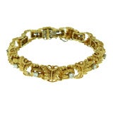 Signed Satsky 18K gold and diamond sectional bracelet
