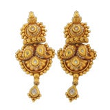 Pair of contemporary 22K gold and diamond earrings