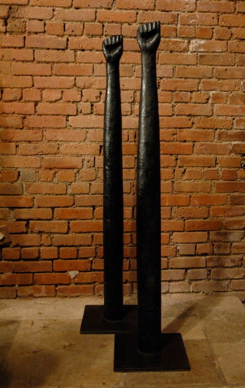 HAND SCULPTURE CAST IN BRONZE<br />
Recreation of mid 19th century cast iron folk art hitching post in the form of an elongated arm, from the southern United States. Sold individually.