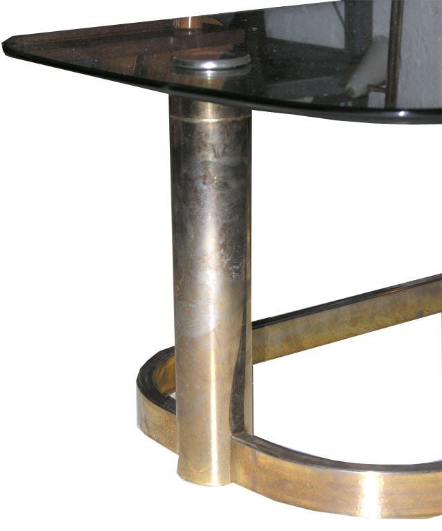 1970's brass framed glass top coffee table in the style of Karl Springer with original detail edged top.<br />
please make an appointment to view.