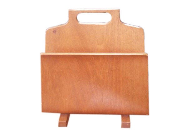 Dunbar magazine holder

Edward Wormley (1907-1995) is perhaps the most admired Mid-Century furniture designer. His timeless designs for Dunbar represent some of the most highly sought examples of this period, as they were handmade and not born