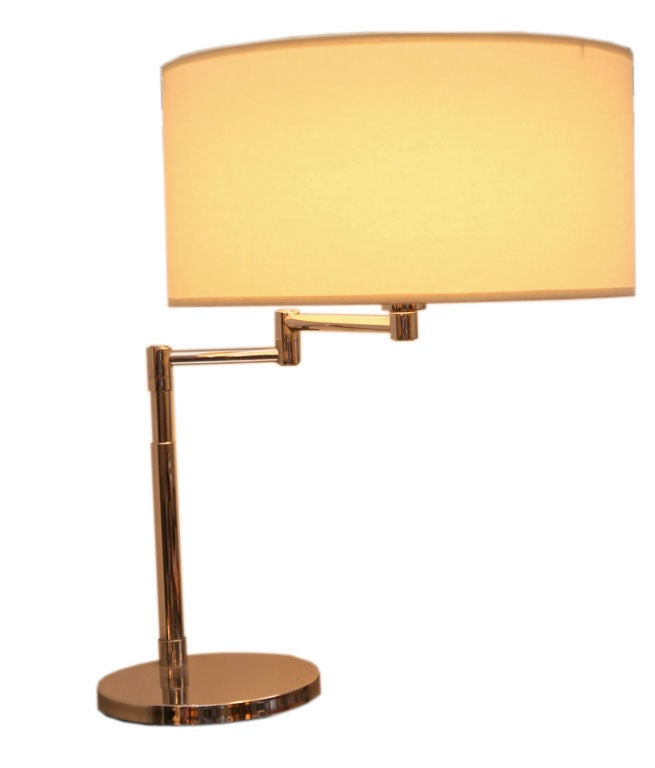 Nessen Studios chrome 1950's telescoping swing arm desk lamp with original milk glsss diffusor and new linen shade.