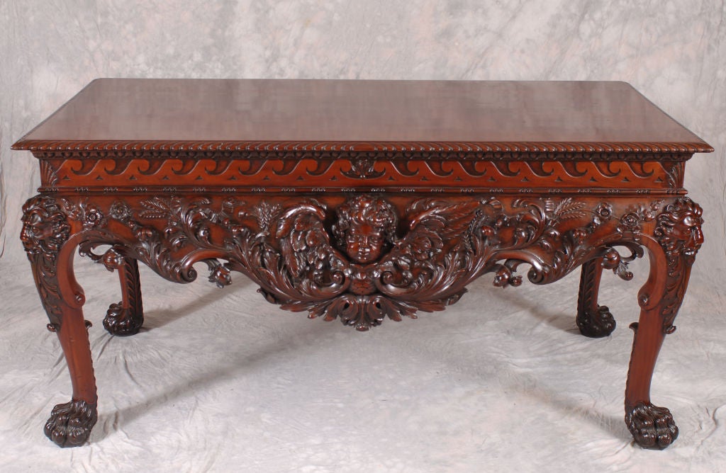 GEORGE II STYLE CARVED MAHOGANY CONSOLE WITH WINGED CHERUBS AN 4