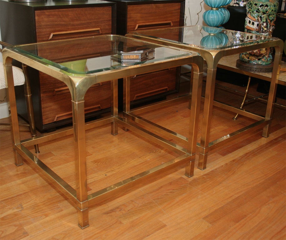 Pair of square brass side tables with rounded corners