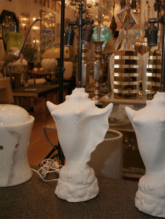 Pair of composition conch form lamps from the Eden Rock Hotel.<br />
<br />
<br />
View our complete collection at www.johnsalibello.com
