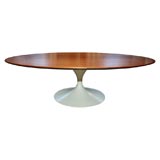 Eero Saarinen oval shaped walnut coffee table, mfg. Knoll
