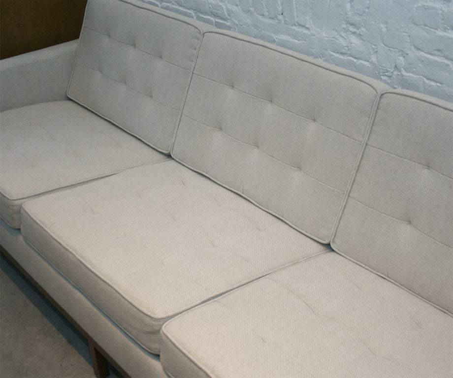 20th Century Florence Knoll 3 seat quilted sofa with wood base
