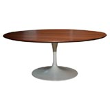 36" round walnut topped Eero Saarinen coffee table, mfg. Knoll