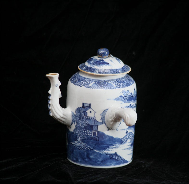 A scarce Chinese porcelain chocolate pot made for the Western<br />
market with pistol form handle. Good strong blue color with<br />
a 