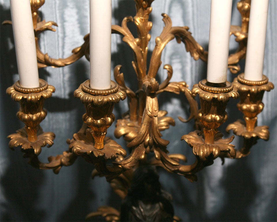 A Patinated and Gilt Bronze Candelabrum 1
