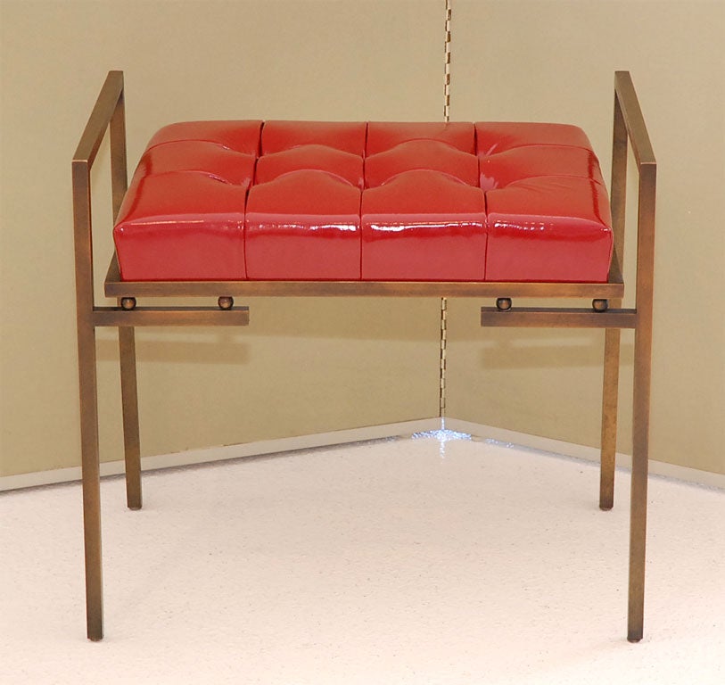 A modernist patinated bronze bench shown upholstered in biscuit-tufted patent leather is custom made by Dragonette Private Label.  Bench is custom order and is priced COM/COL.  2 yards required. Price quoted is for the finish as shown, other