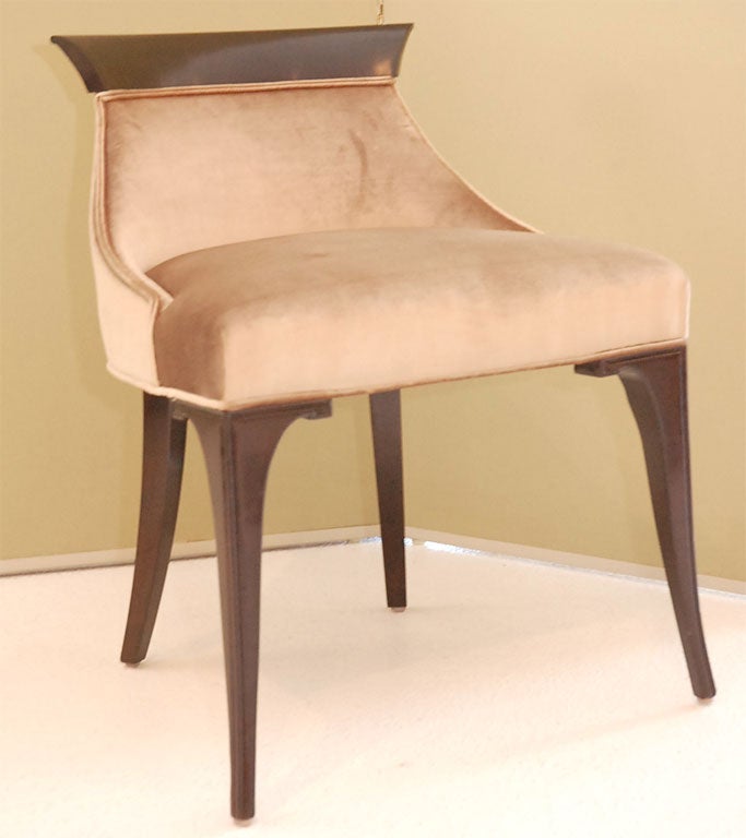 This elegant piece, modeled after a vintage 1940 vanity chair, is custom order only and priced COM.  The graceful walnut frame is shown in a high gloss espresso finish.

3 yards of upholstery fabric is required.  

Please allow six to eight