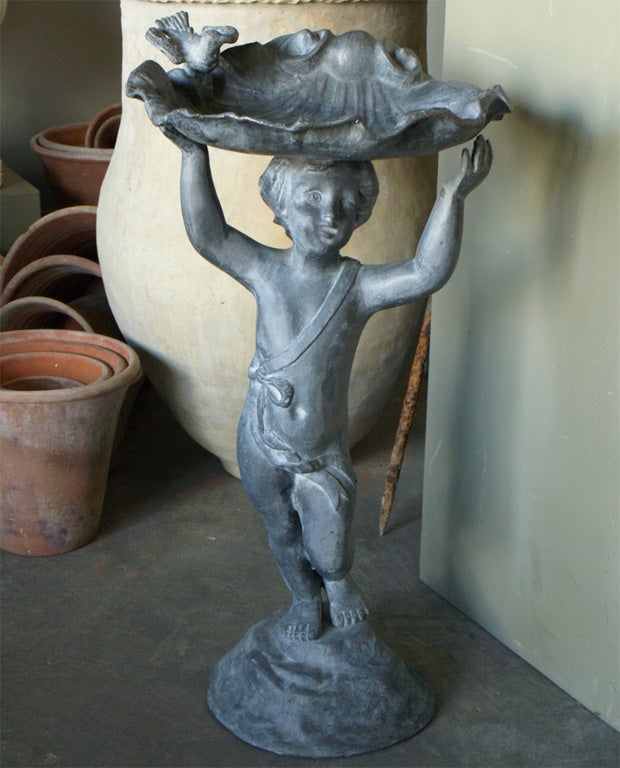 A classical Florentine lead birdbath produced by the Bulbeck Foundry, English.