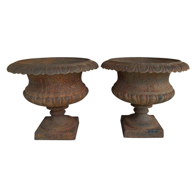 Pair of Cast Iron Urns For Sale