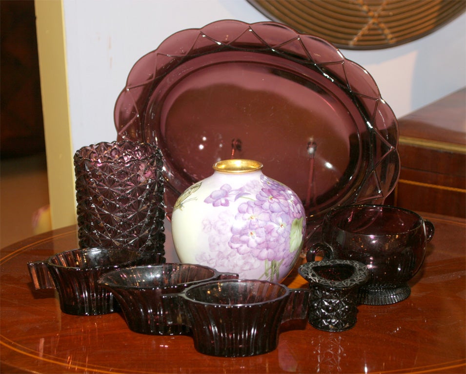 8 piece Purple glass and pottery collection