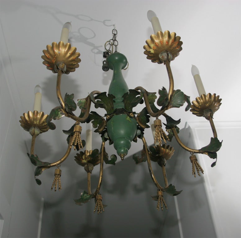 Green painted wood center with six gilded metal arms decorated with acanthus leaves and metal tassels.