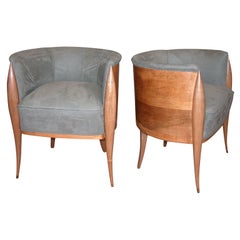 PAIR OF UPHOLSTERED WOOD BARREL CHAIRS