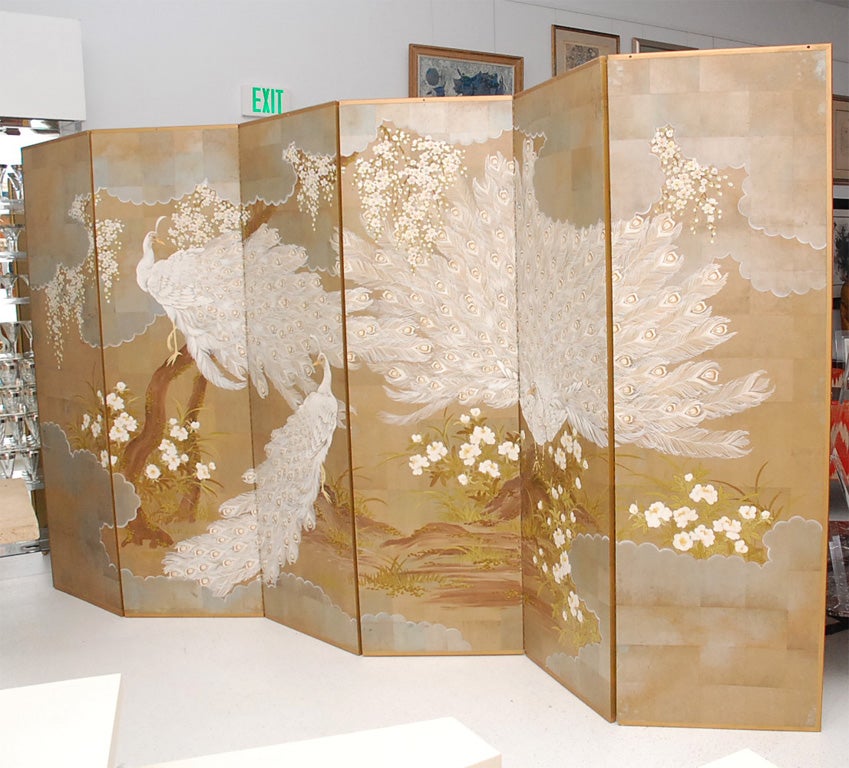 Beautiful, large six-panel folding screen with handpainted scene of white peacocks.  The screen is signed and in very good original condition. <br />
<br />
There are signs of gentle age and patina, and one small hole near the top of each panel-