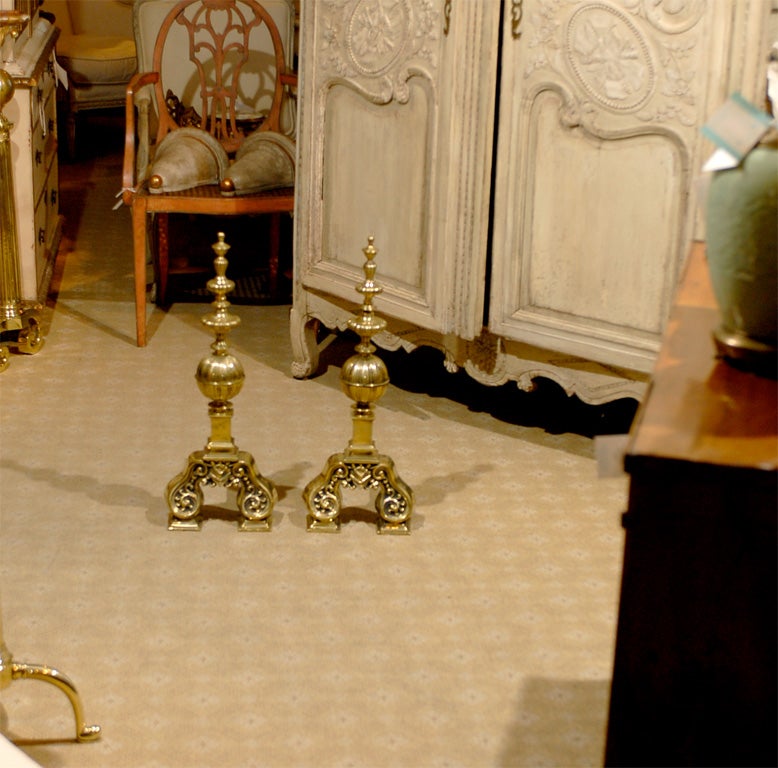 PAIR OF BRASS ANDIRONS WITH BALL AND SPIRE FINIAL