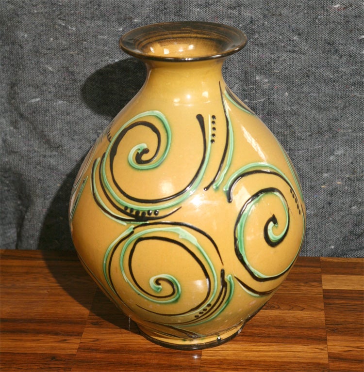 Large pottery vase from the Danish Kaehler Keramik factory, ground in yellow with green and black swirls by artist Julia Kabel.